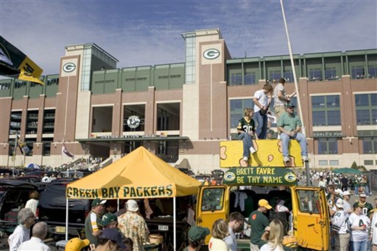 Fans outside of Lambeau Field before the Green Bay Packers game against the Chicago Bears on September 19, 2004 in Green Bay, Wisconsin. (AP Photo/David Stluka)